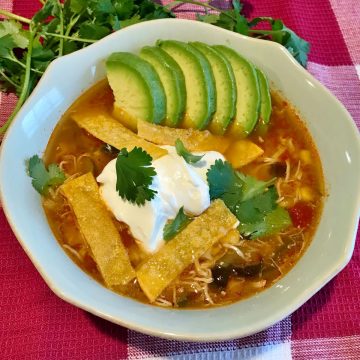 Chicken Tortilla Soup in a blue bowl.