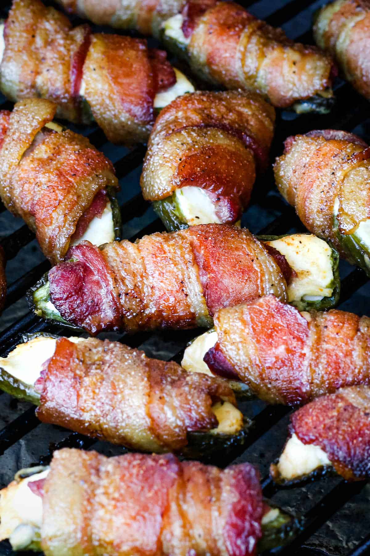 Smoked venison jalapeno poppers in a pellet grill.