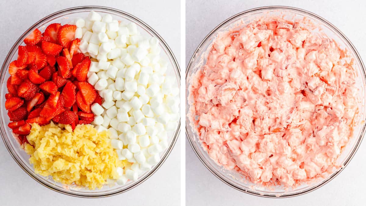Folding the sliced strawberries, crushed pineapple, and mini marshmallows into the cool whip mixture.