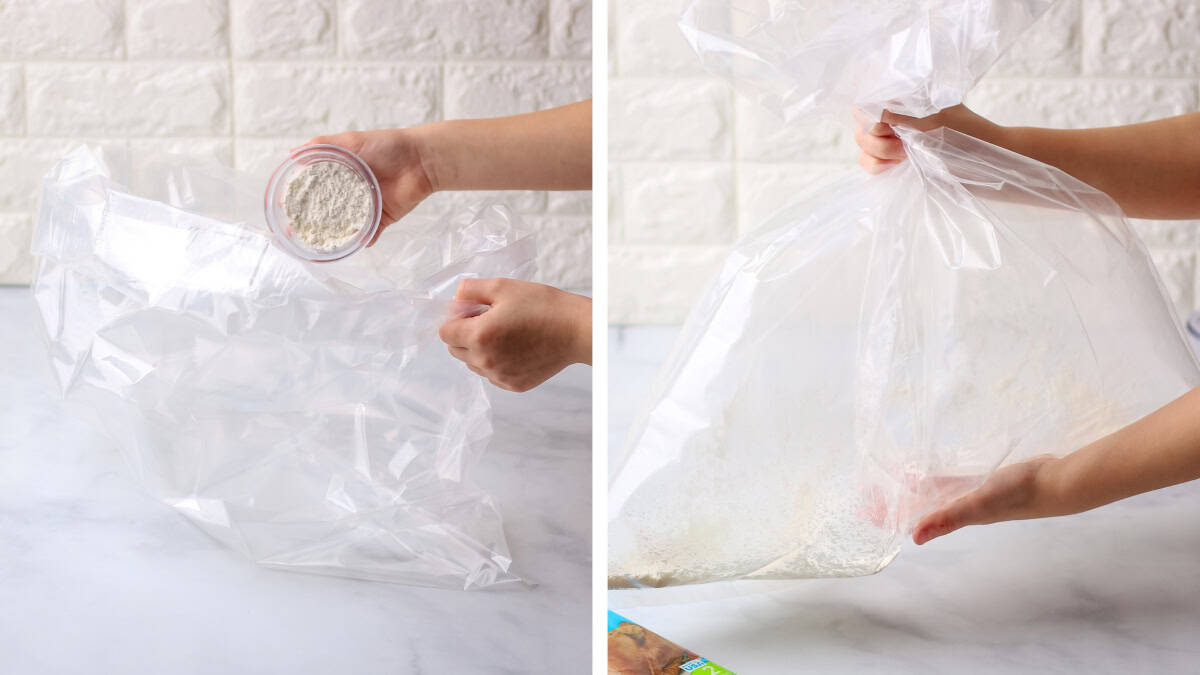 Adding flour to the oven bag and shaking it to coat.